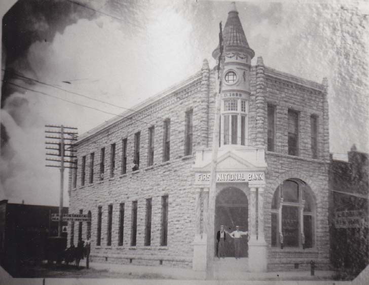 Photo of exterior view of First National Bank building in 1920s or 1930s